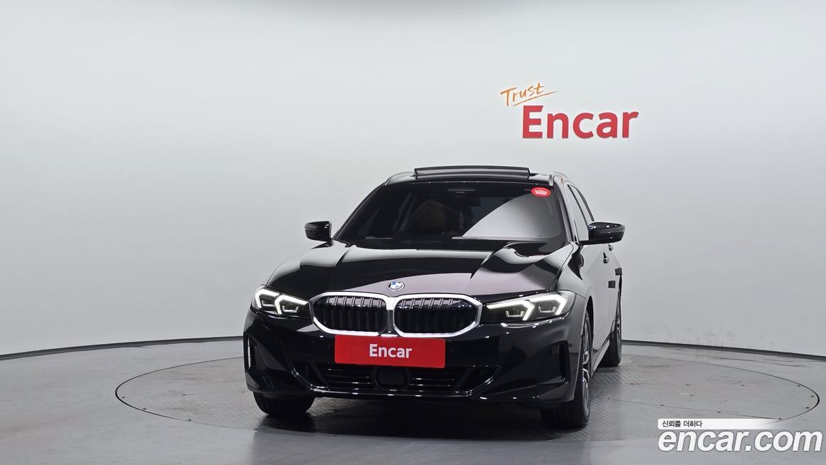 BMW 3-Series 320i Touring, 2023