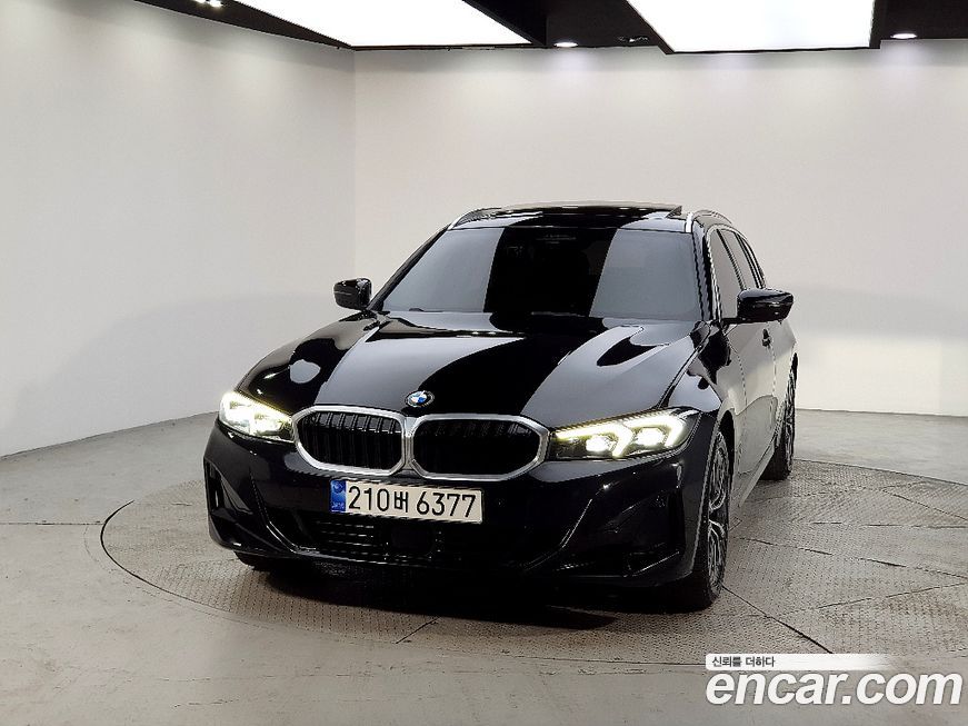BMW 3-Series 320i Touring, 2023